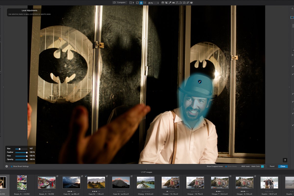 Screenshot of PhotoLab 7 interface with a face highlighted for editing